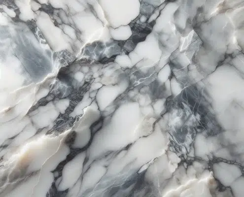 Surface de marbre avec des motifs naturels et des veines de couleur, offrant une apparence élégante et raffinée.